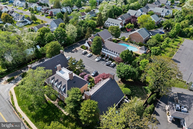 aerial view of residential area featuring a pool