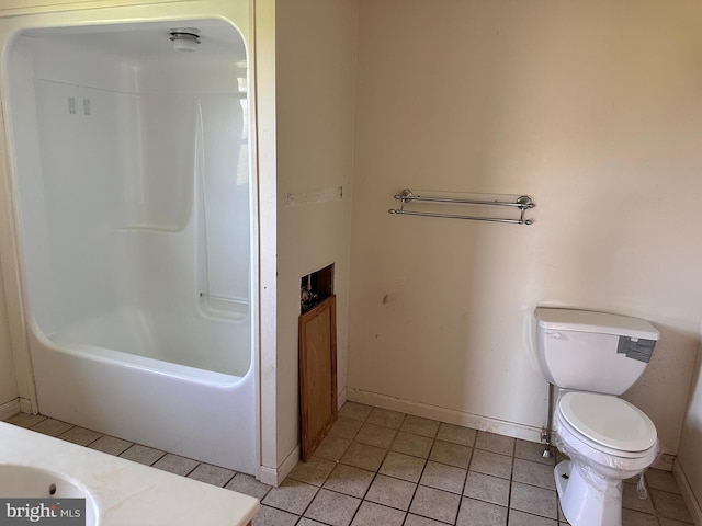 full bathroom with tile patterned floors, vanity, and baseboards