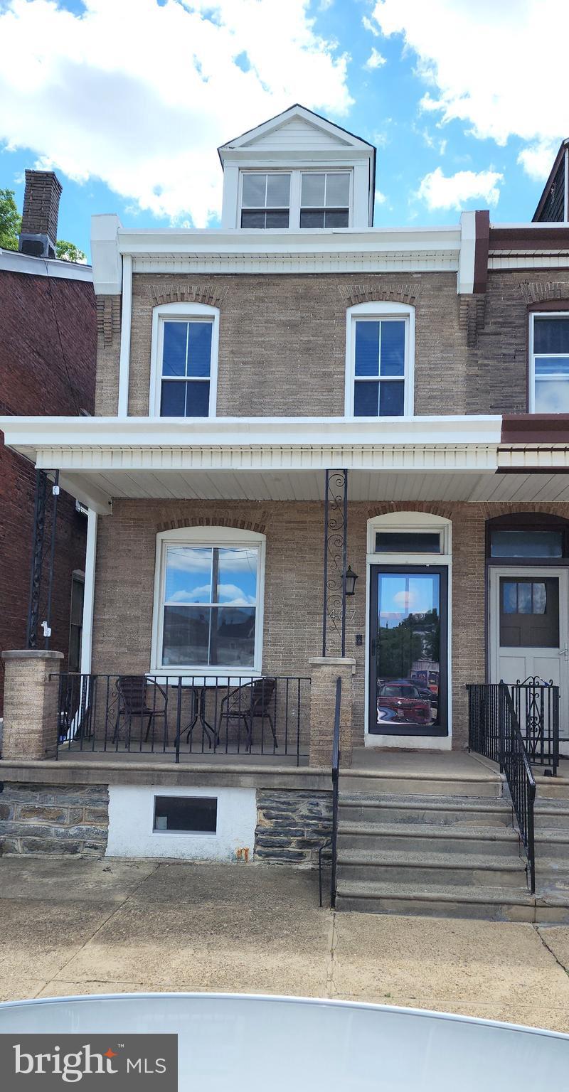 multi unit property featuring covered porch