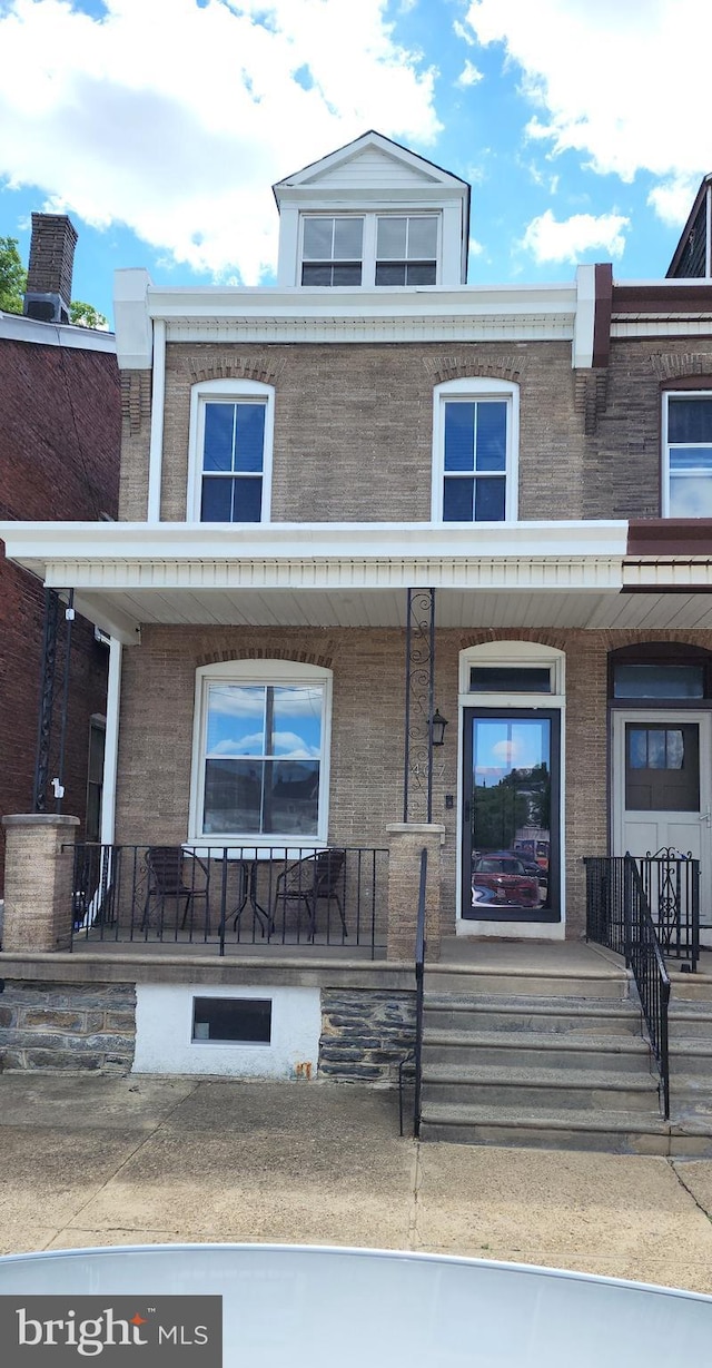 multi unit property featuring covered porch