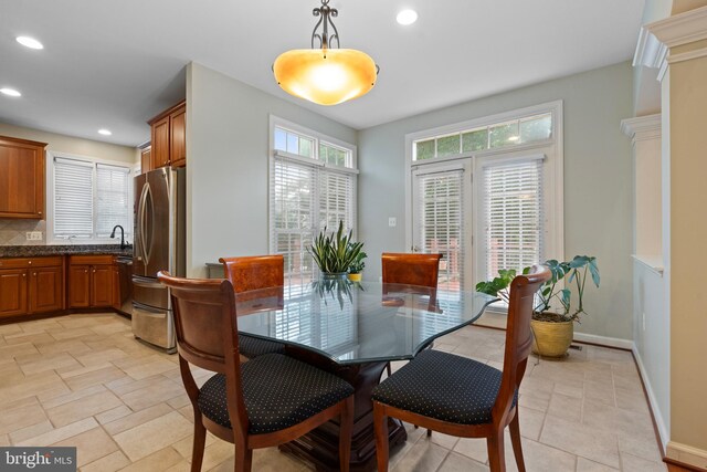 dining area featuring recessed lighting and baseboards