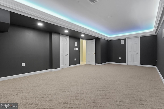 empty room with light carpet, baseboards, and recessed lighting