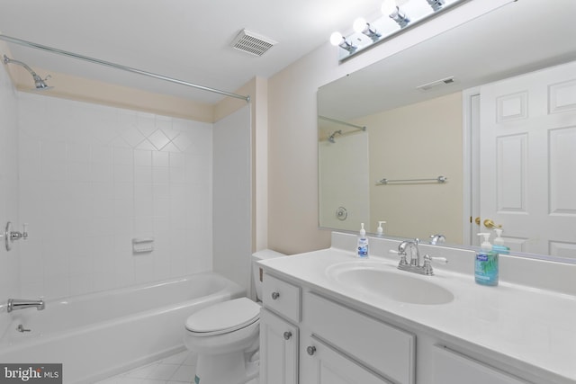 bathroom featuring toilet, tile patterned floors, shower / bath combination, and vanity