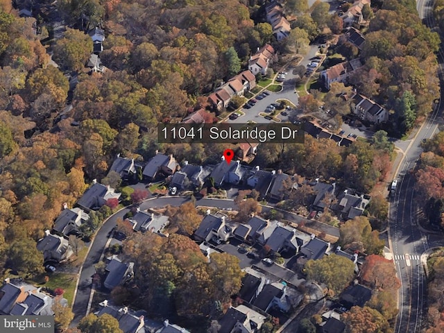 11041 Solaridge Dr, Reston, VA 20191 - aerial view of property and surrounding area featuring nearby suburban area and a heavily wooded area
