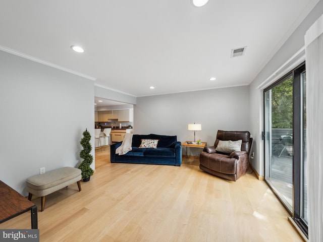 11041 Solaridge Dr, Reston, VA 20191 - living room with crown molding, light wood finished floors, and recessed lighting