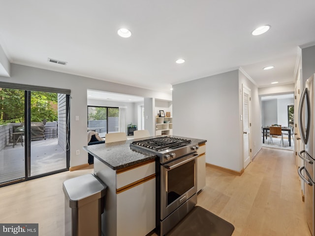 11041 Solaridge Dr, Reston, VA 20191 - kitchen featuring appliances with stainless steel finishes, light wood-style flooring, baseboards, recessed lighting, and dark stone countertops
