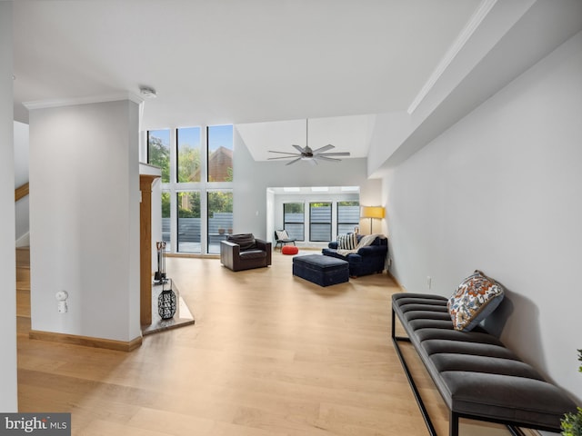 11041 Solaridge Dr, Reston, VA 20191 - living room featuring wood finished floors, crown molding, and a ceiling fan
