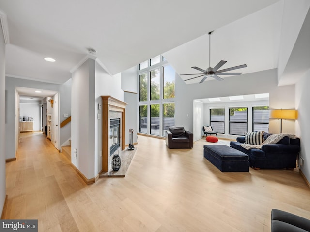 11041 Solaridge Dr, Reston, VA 20191 - living room with light wood-type flooring, a ceiling fan, recessed lighting, baseboards, and a towering ceiling