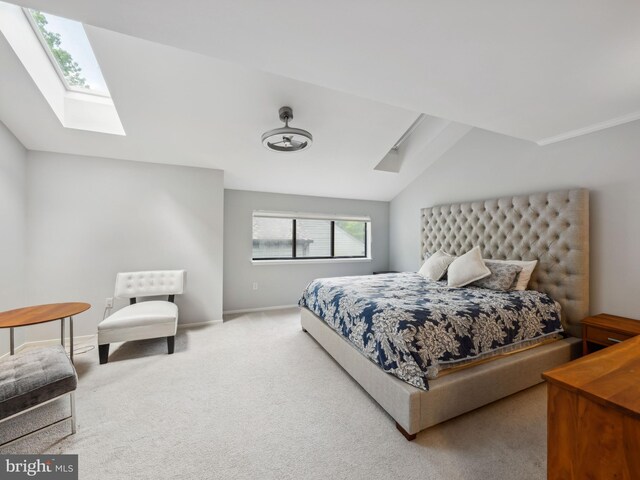 11041 Solaridge Dr, Reston, VA 20191 - carpeted bedroom with a skylight, lofted ceiling, and baseboards