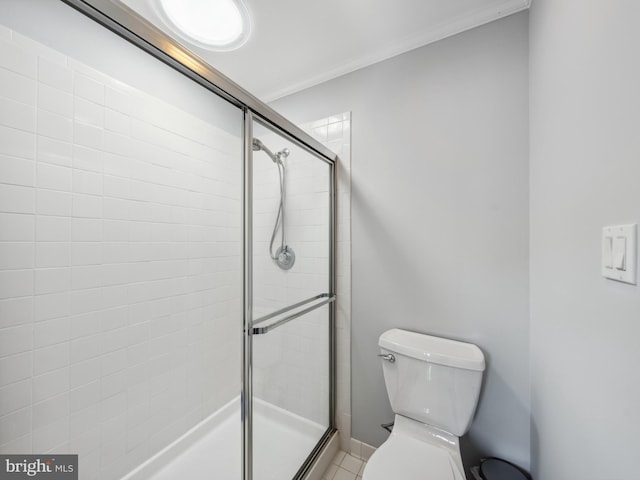11041 Solaridge Dr, Reston, VA 20191 - bathroom featuring toilet, a shower stall, crown molding, and tile patterned floors