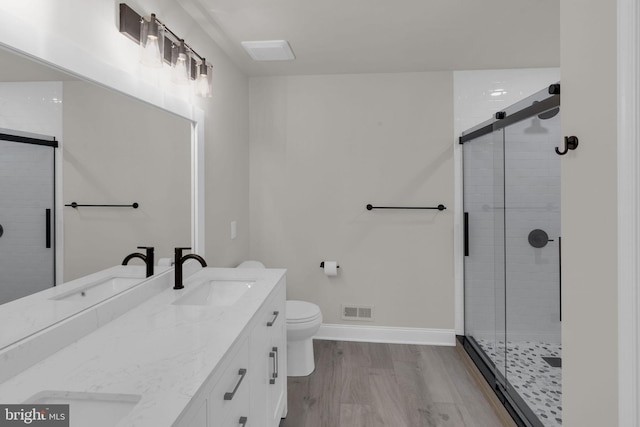 66 Cypress Pl, Newtown, PA 18940 - full bath with wood finished floors, a stall shower, baseboards, and toilet