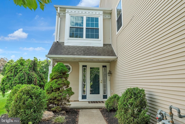 66 Cypress Pl, Newtown, PA 18940 - view of exterior entry with roof with shingles
