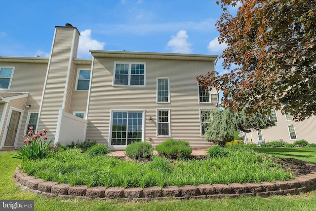 66 Cypress Pl, Newtown, PA 18940 - back of house featuring a chimney