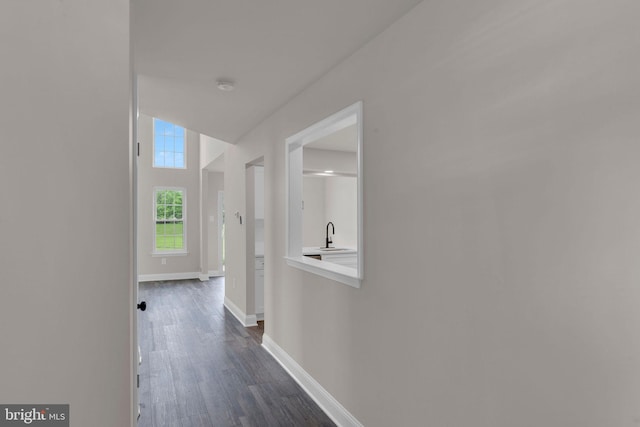 66 Cypress Pl, Newtown, PA 18940 - hall featuring baseboards, dark wood finished floors, and a sink