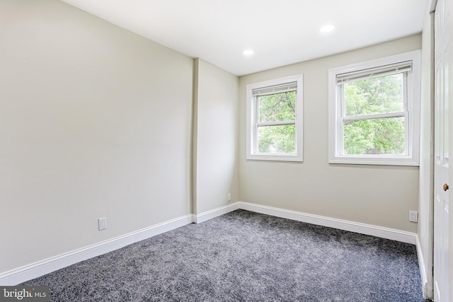 unfurnished room with carpet, baseboards, and recessed lighting