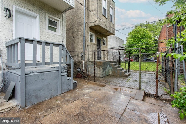 view of patio / terrace featuring fence