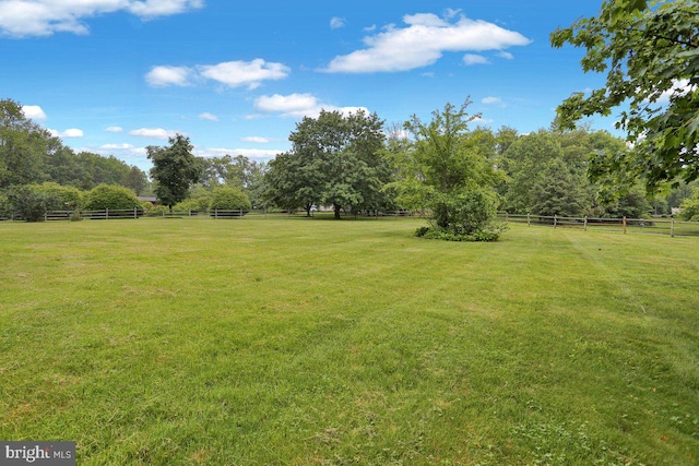 view of yard featuring a view of countryside