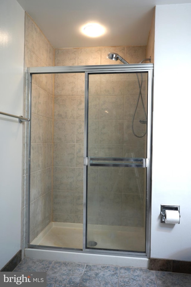 full bath featuring a stall shower