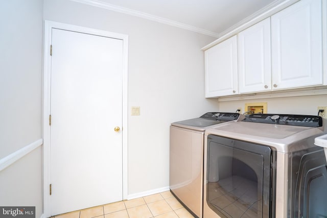 55 Cambridge Way, Princeton Junction, NJ 08550 - washroom featuring cabinet space, washer and clothes dryer, crown molding, baseboards, and light tile patterned floors