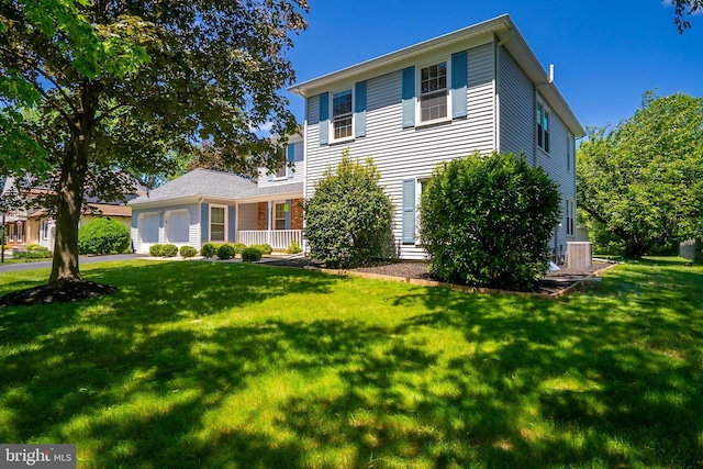 55 Cambridge Way, Princeton Junction, NJ 08550 - view of front of property with an attached garage, a front lawn, and cooling unit