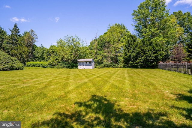 55 Cambridge Way, Princeton Junction, NJ 08550 - view of yard with an outbuilding and a forest view