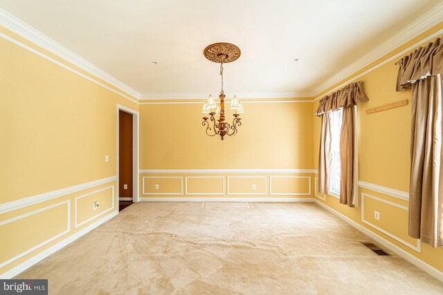 15602 Sir Edwards Dr, Upper Marlboro, MD 20772 - spare room featuring a chandelier, ornamental molding, a decorative wall, a wainscoted wall, and carpet