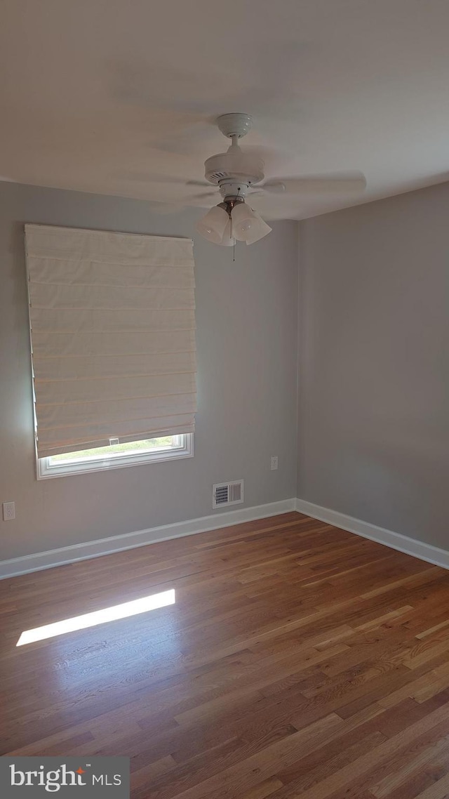 6512 Carriage Dr, Alexandria, VA 22310 - empty room with wood finished floors and ceiling fan