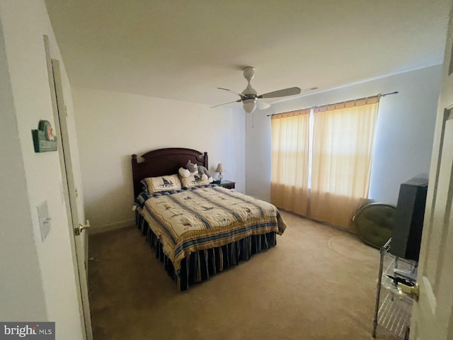 bedroom featuring carpet flooring and ceiling fan