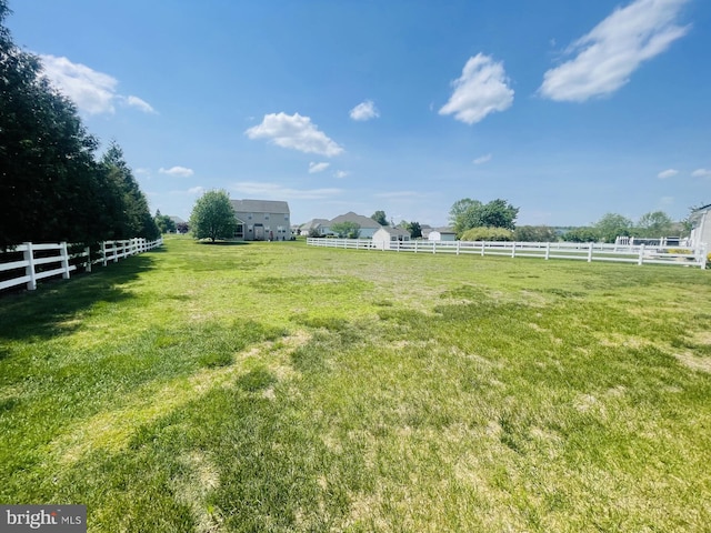 view of yard featuring a view of countryside