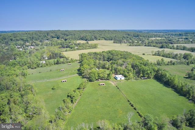 overview of rural landscape featuring a heavily wooded area