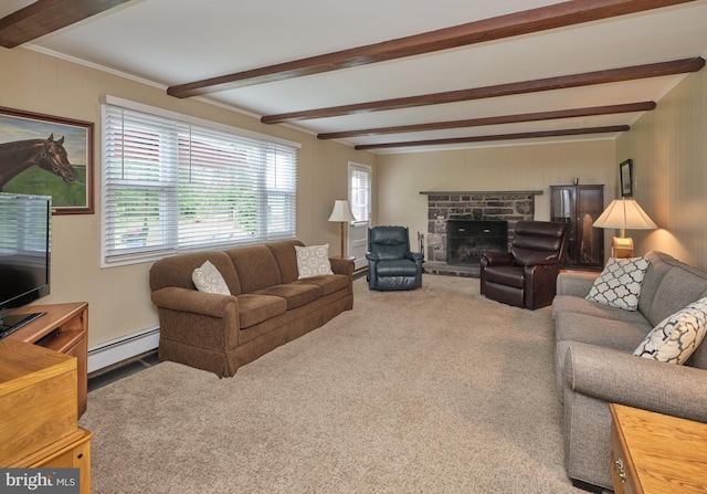 carpeted living room featuring baseboard heating, beam ceiling, and a stone fireplace