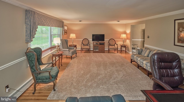 living area featuring baseboard heating, wood finished floors, crown molding, a baseboard radiator, and baseboards