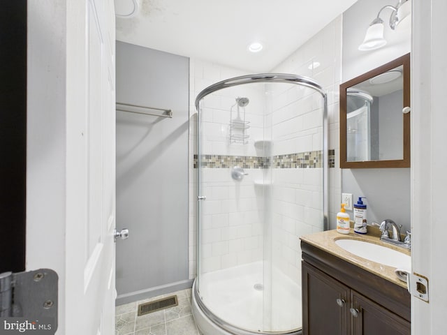 20852 Country Rd, Georgetown, DE 19947 - bathroom with a stall shower, vanity, and recessed lighting