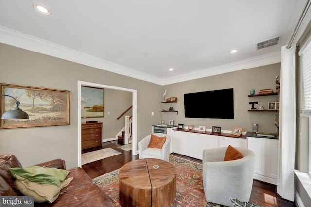 living room featuring stairway, dark wood-style flooring, crown molding, and recessed lighting