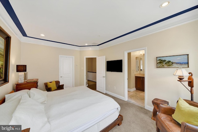bedroom with ornamental molding, light colored carpet, baseboards, recessed lighting, and connected bathroom