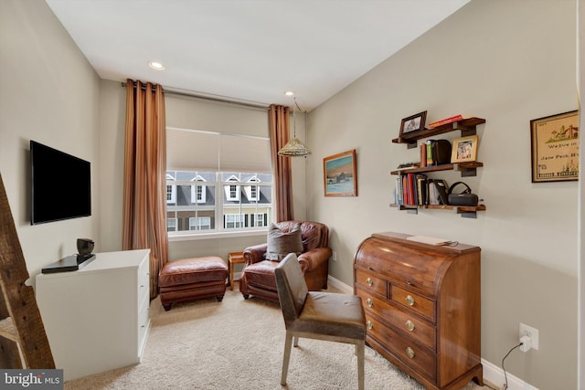 sitting room with carpet floors, recessed lighting, and baseboards