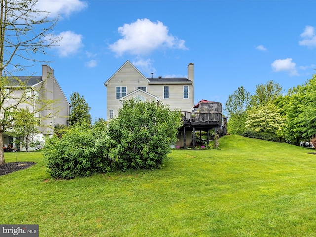 13241 Manor Dr S, Mount Airy, MD 21771 - rear view of property with a wooden deck, a yard, and a chimney