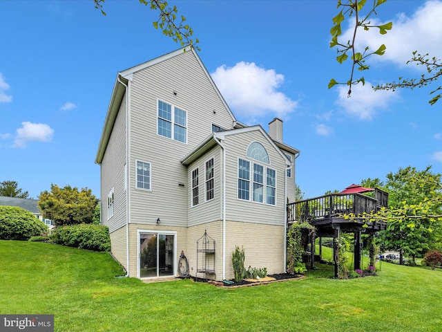 13241 Manor Dr S, Mount Airy, MD 21771 - rear view of property featuring a chimney, a wooden deck, and a yard