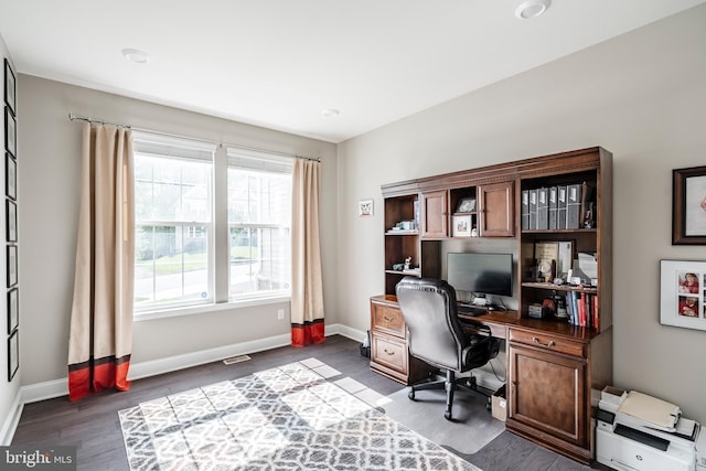 office with baseboards and dark wood finished floors