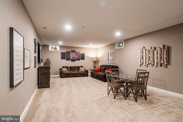 dining area with light colored carpet, baseboards, and recessed lighting