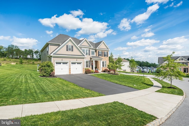 view of front facade with asphalt driveway, an attached garage, a front lawn, and brick siding