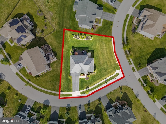 aerial perspective of suburban area featuring property boundaries highlighted
