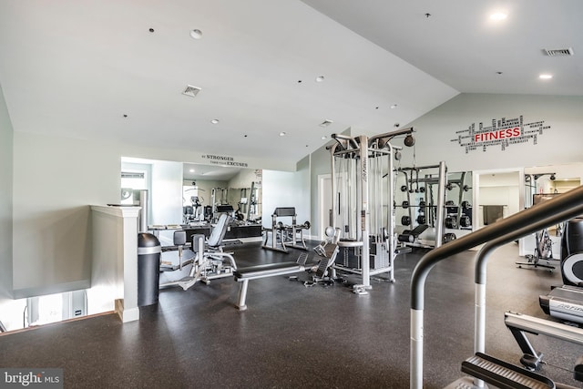 workout area featuring vaulted ceiling