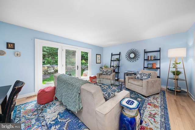 18 Beethoven Dr, Wilmington, DE 19807 - living room featuring wood finished floors and baseboards
