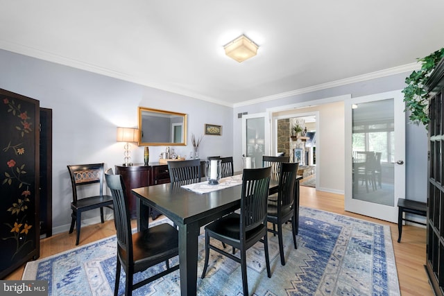 18 Beethoven Dr, Wilmington, DE 19807 - dining space with ornamental molding, light wood finished floors, and baseboards