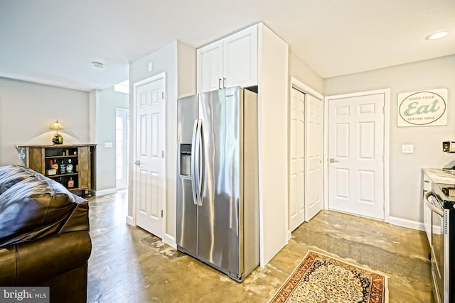 111 Seabright Way Unit E3, Rehoboth Beach, DE 19971 - kitchen featuring stainless steel appliances, white cabinets, and baseboards