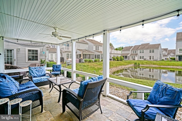 111 Seabright Way Unit E3, Rehoboth Beach, DE 19971 - sunroom with outdoor lounge area, ceiling fan, a water view, and a residential view