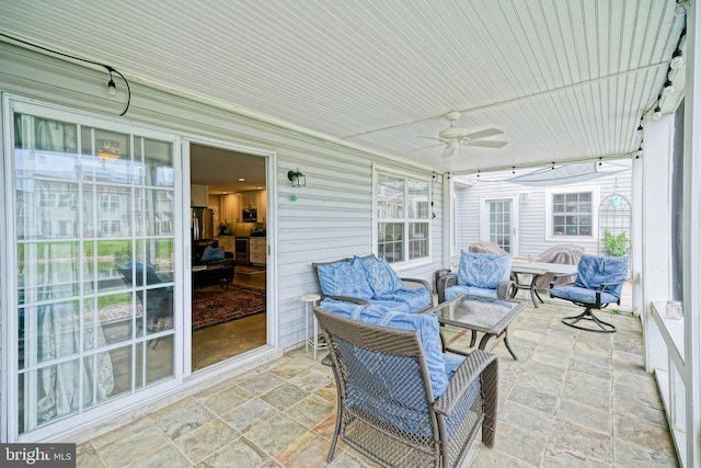 111 Seabright Way Unit E3, Rehoboth Beach, DE 19971 - sunroom / solarium with ceiling fan and outdoor lounge area