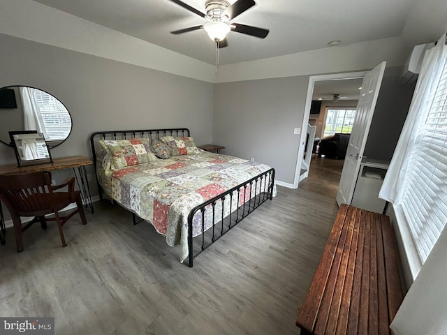111 Seabright Way Unit E3, Rehoboth Beach, DE 19971 - bedroom featuring wood finished floors, baseboards, and a ceiling fan