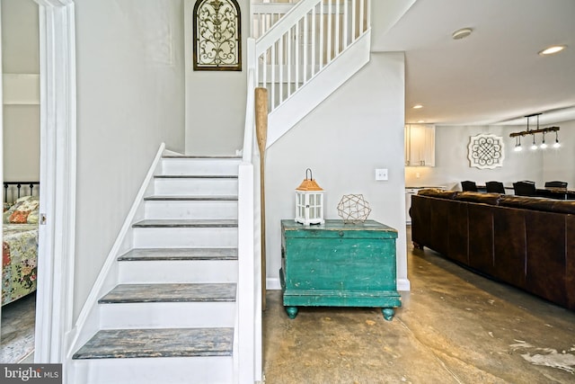 111 Seabright Way Unit E3, Rehoboth Beach, DE 19971 - staircase featuring finished concrete floors and recessed lighting